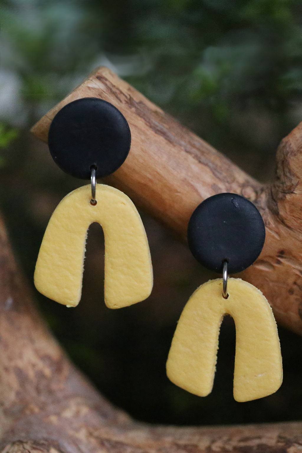 Handmade black and yellow arch polymer clay earrings made with FIMO Germany clay lightweight waterproof modern geometric statement jewelry by Seema Clay Jewelry