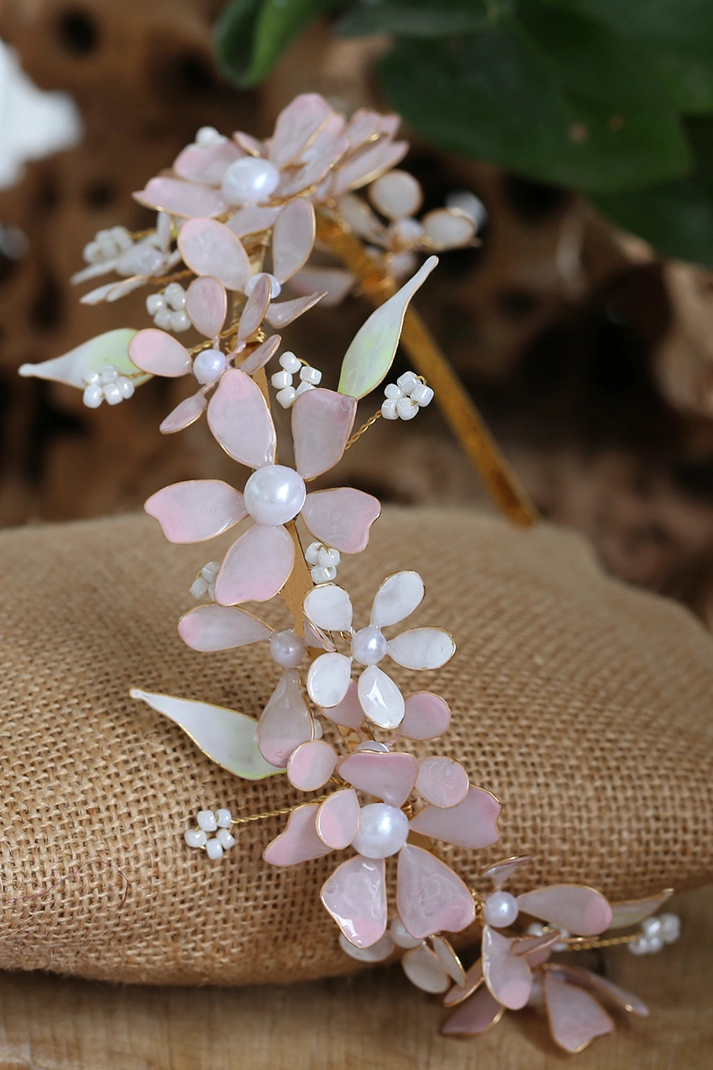 Aurora’s Whisper handmade light pink resin floral bridal headband with gold-plated copper wire and pearl accents, customizable wedding hair accessory