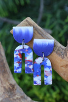 Handmade blue white marbled polymer clay arch earrings made with FIMO Germany clay lightweight waterproof modern geometric statement jewelry by Seema Clay Jewelry