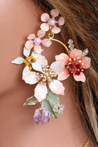 Coral Caress handmade resin floral bridal earrings with coral pink, peach, and white flowers, accented with gold-plated copper wire and pearl drops – lightweight customizable earrings for Haldi, Mehndi, and wedding ceremonies.