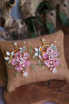 Elysian Blossom floral resin bridal earrings with pastel petals, pearls and gold-plated wire — part of Elysian Blossom set.