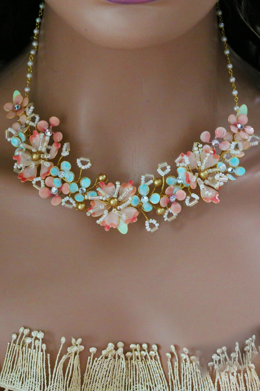 Seraphina’s Bloom handmade resin floral bridal necklace in blush pink, aqua, and gold-plated copper – lightweight, customizable wedding jewelry by Seema Clay Jewelry.