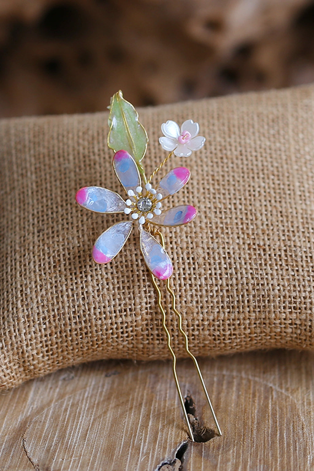 Handmade resin floral bridal hair pin with pink and blue petals, lightweight waterproof wedding hair accessory for bridal bun